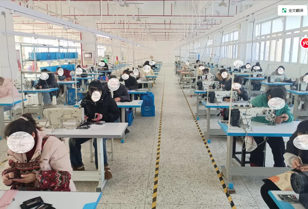 Rows of sewing stations in the bag production workshop